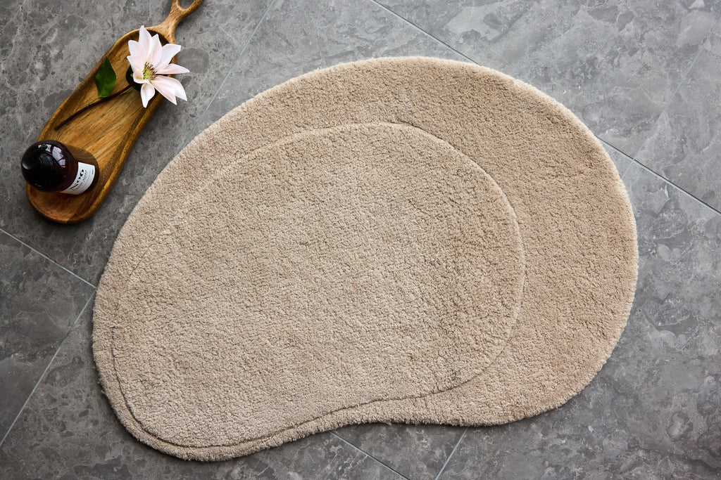 Elvis oval badrumsmatta 60x85 cm benvit med tygbaksida