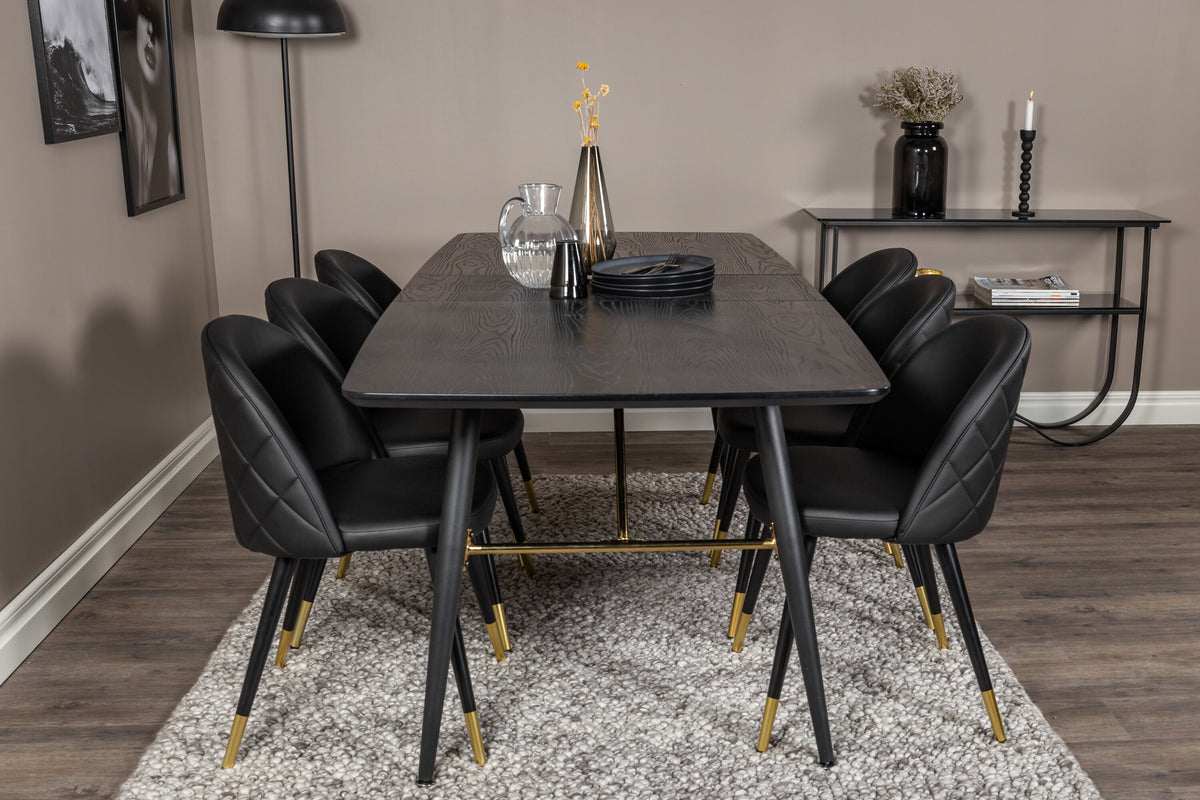 Gold utdragbart matbord 180/220x85xH76 svart faner med svarta ben och mässingsdetaljer med 6 sammetsstolar med stickningar PU svart/svart