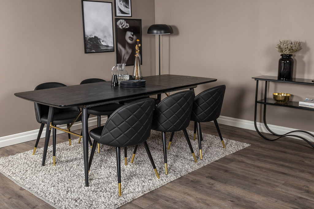 Gold utdragbart matbord 180/220x85xH76 svart faner med svarta ben och mässingsdetaljer med 6 sammetsstolar med stickningar PU svart/svart