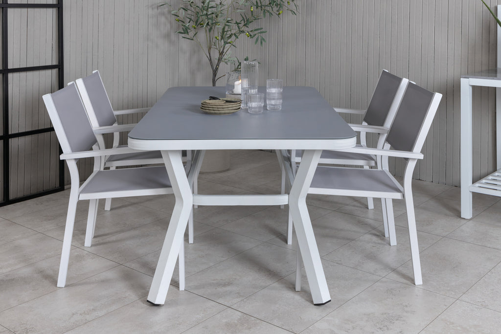Virya matbord vit aluminium/grått glas med 4 Copacabana stapelbara stolar vit/grå