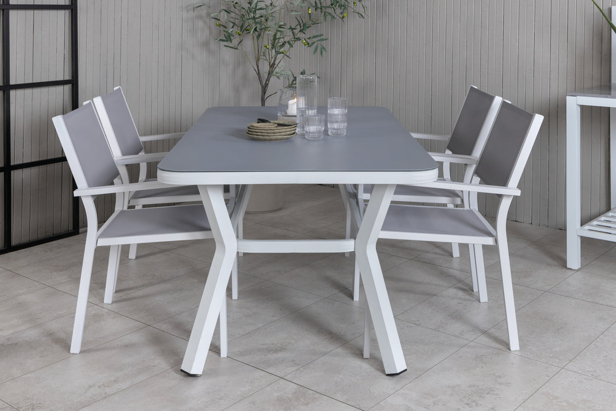 Virya matbord vit aluminium/grått glas med 4 Copacabana stapelbara stolar vit/grå