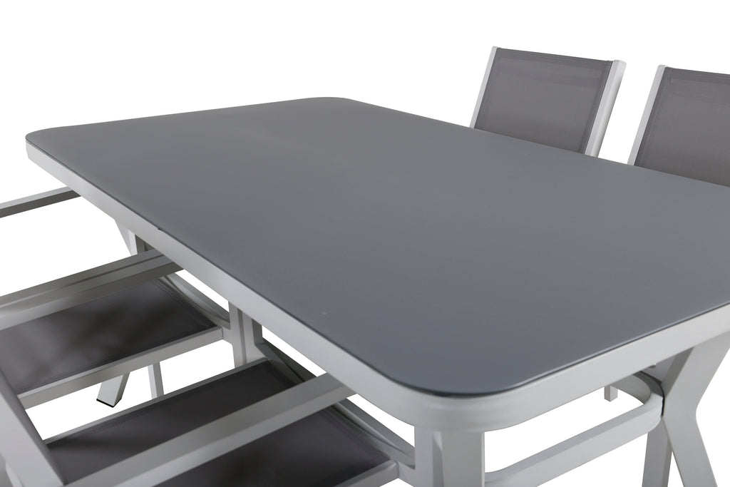 Virya matbord vit aluminium/grått glas med 4 Copacabana stapelbara stolar vit/grå