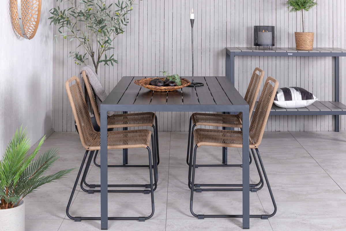 Break bord svart/svart 150x90 med 4 Lindos stapelbara stolar svart aluminium/latte rep