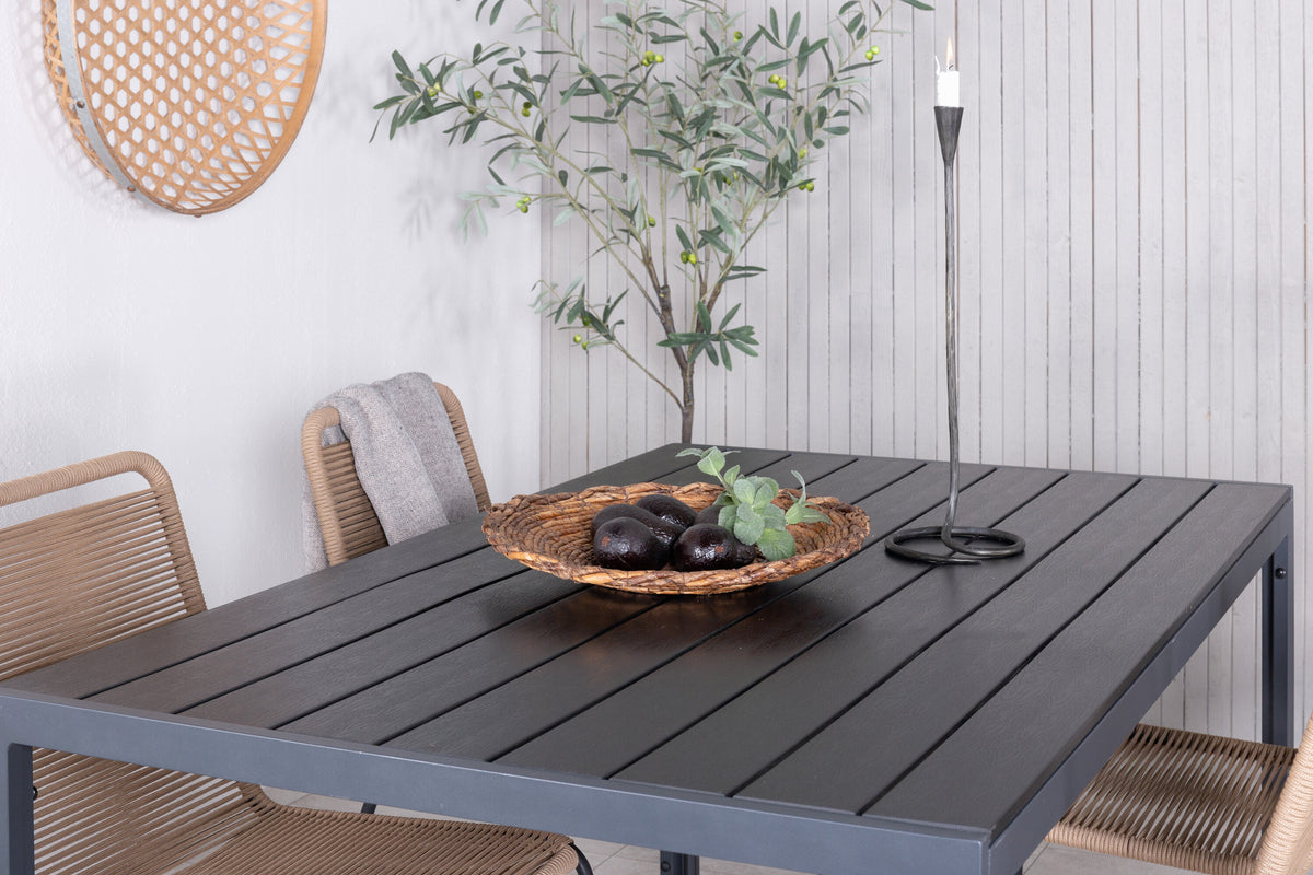 Break bord svart/svart 150x90 med 4 Lindos stapelbara stolar svart aluminium/latte rep