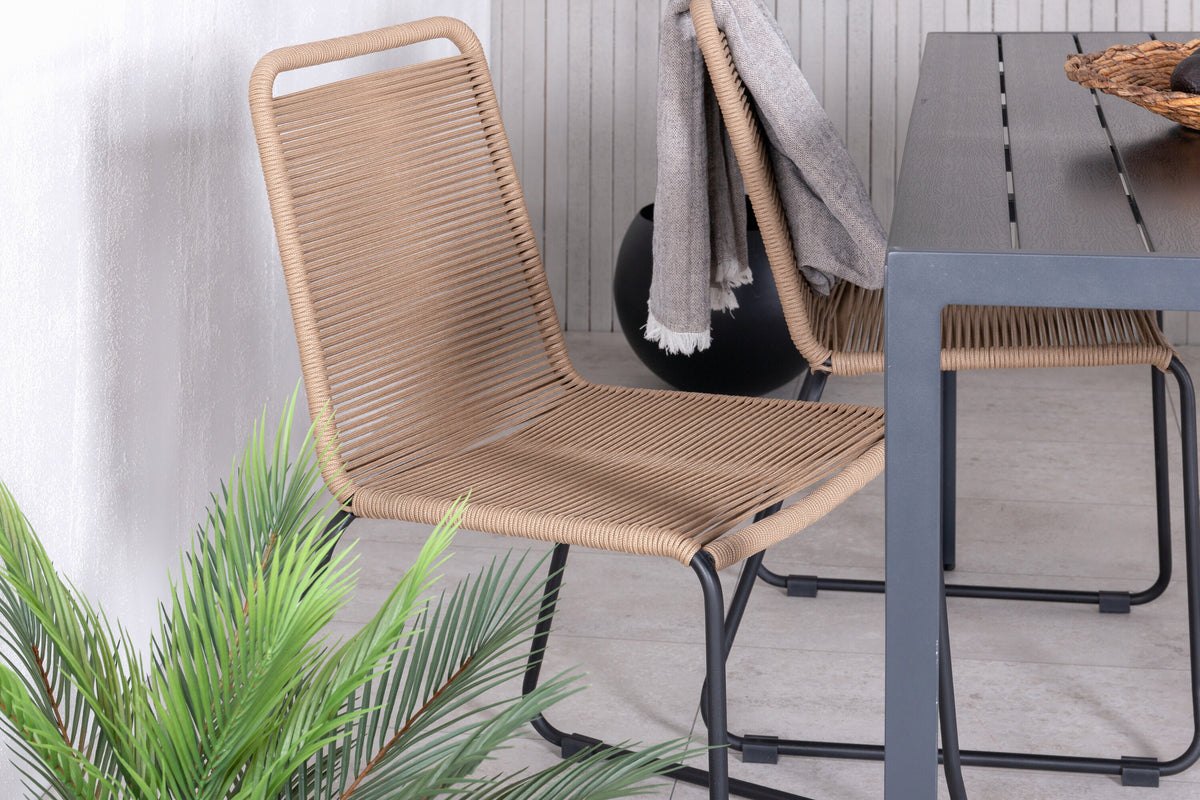 Break bord svart/svart 150x90 med 4 Lindos stapelbara stolar svart aluminium/latte rep