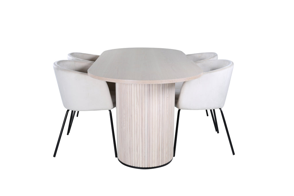 Bianca oval matgrupp med 4 Berit-stolar vitlaserad och svart faner med beige sammet