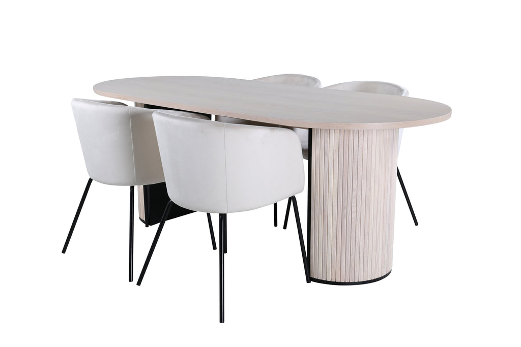 Bianca oval matgrupp med 4 Berit-stolar vitlaserad och svart faner med beige sammet