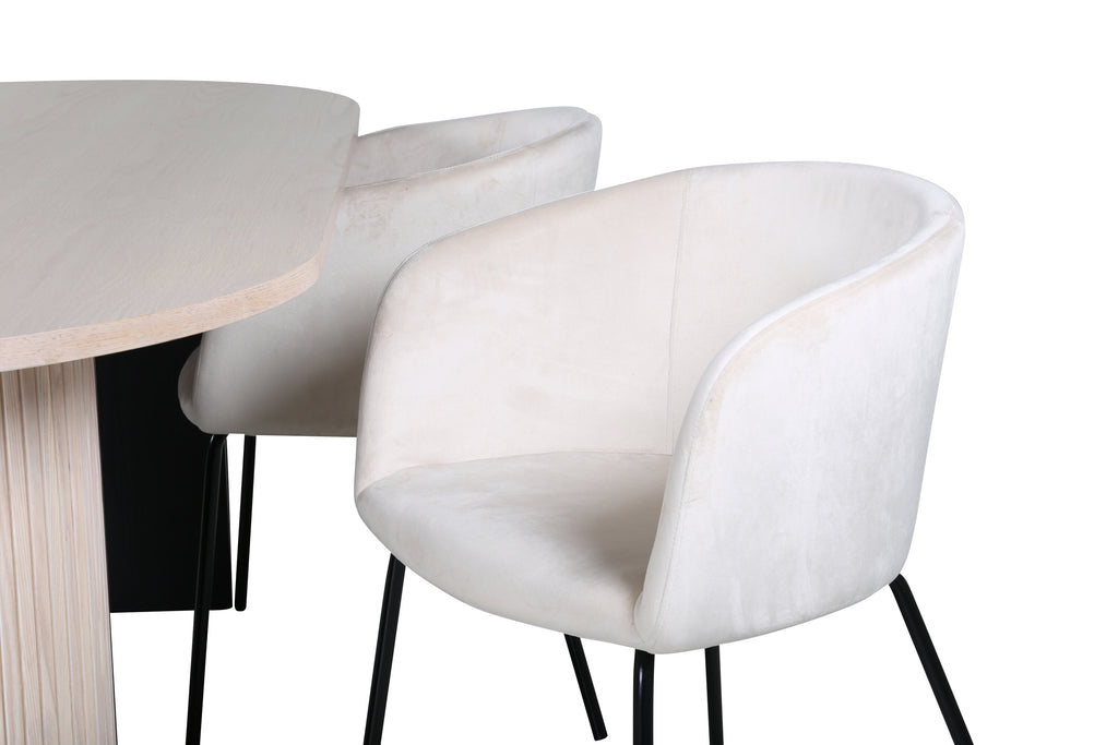 Bianca oval matgrupp med 4 Berit-stolar vitlaserad och svart faner med beige sammet