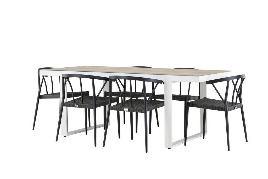 Merlo matgrupp med Stina-stolar vit och vitlaserad med svart aluminium och konstrotting